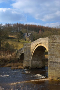 Stone bridge over River Wharfe in Yorkshire dales